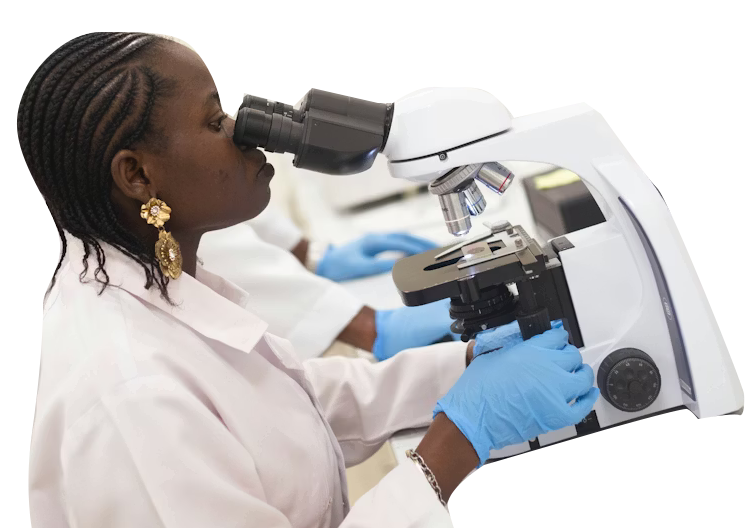 Researcher using a microscope